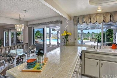 Surrounded by sliding patio doors and dual-pane wh