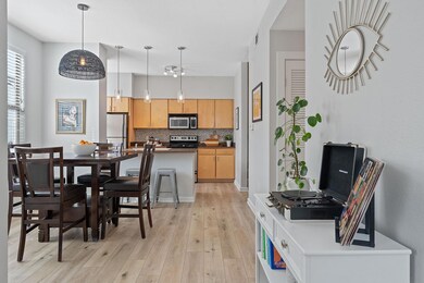 Dining space with light wood-style floors