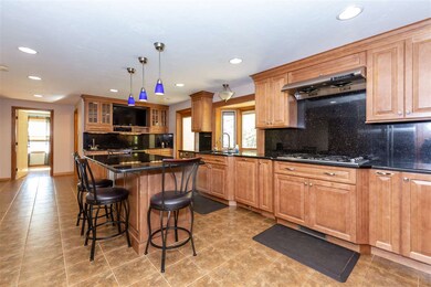 Updated kitchen with custom cabinets by Capital Ki