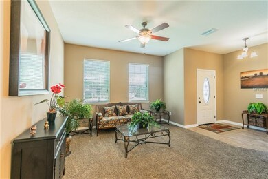 Living room with entry door on right