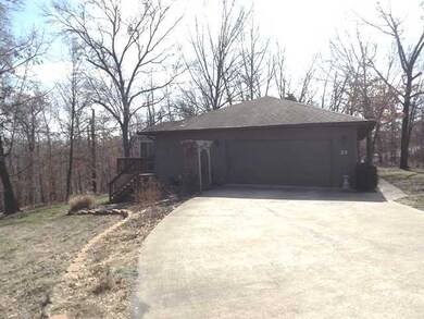 Exterior Back/Side. Easy In-Easy Out Level Driveway