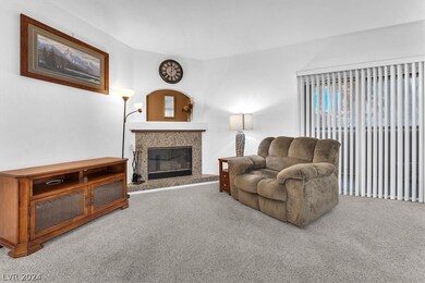 Granite surround fireplace with hearth in Living R