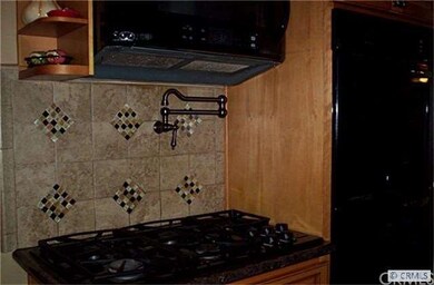 5 burner stove, double convection oven, microwave 