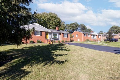 Large level front yard w/ beautiful Hemlock tree