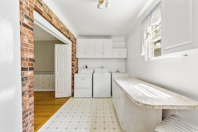 Clothes washing area with cabinets, independent wa