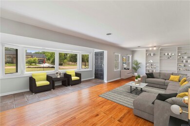 Living Room features abundant natural light and wo