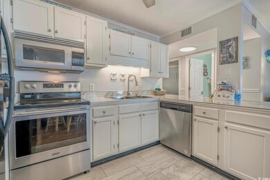 Kitchen with sink, crown molding, appliances with 