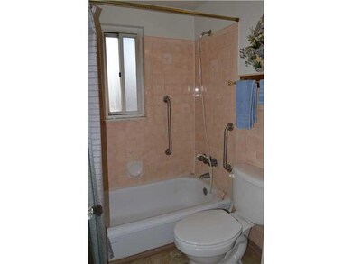 Full Bath. Full Bath that is located in the hallwa