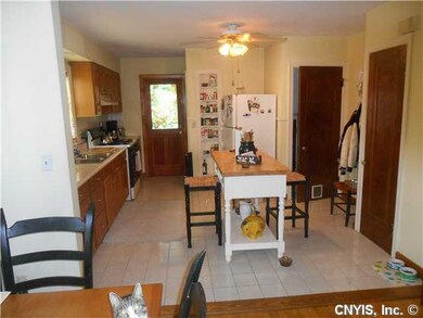 Kitchen FEATURES CUSTOM OAK CABINETS CERAMIC FLOOR