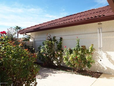 Front enclosed courtyard has a rose gard