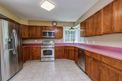 Spacious kitchen with stainless steel appliances a