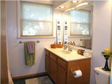 The renovated full bath near the three bedrooms.