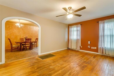 Living room with view of dining room area inside k