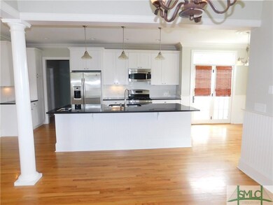 Gourmet kitchen with stainless appliances, gas ran