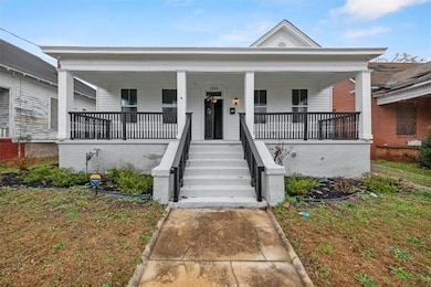 View of front of property with a porch