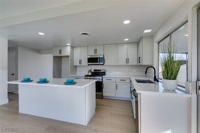 Kitchen with visible vents, recessed lighting, app