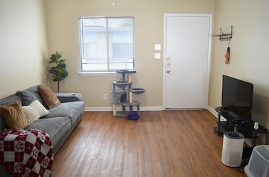 Living room featuring wood finished floors