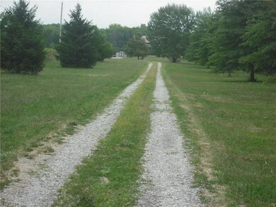900 ft. set back from the road. Beautiful setting.