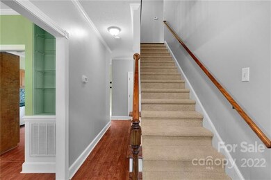 Elegant entry features laminate hardwoods