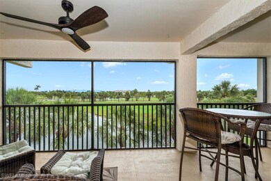 Sunroom featuring golf course view
