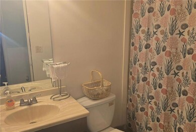 Full bath featuring vanity and a shower with shower curtain