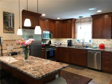 granite countertops, travatine back...