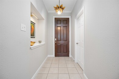 Large foyer upon entering with generous utility room just off front door.