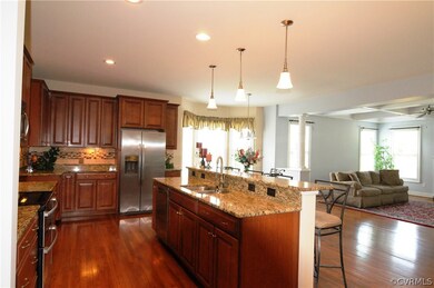 Beautiful granite counters and maple cabinets.  To