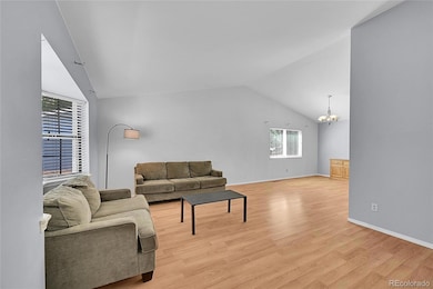 The formal living room off of the foyer, opens to the formal dining room! The bay window provides lots of light - cosy up with a book and relax!