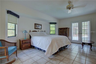 Light and airy Second Master Suite with French Doo