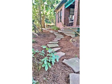 Land/Lot. PATHWAY LEADS TO BACK YARD GARDEN