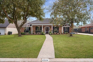 Quaint brick home with southern charm.