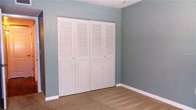View of the front bedroom with plenty of closet sp