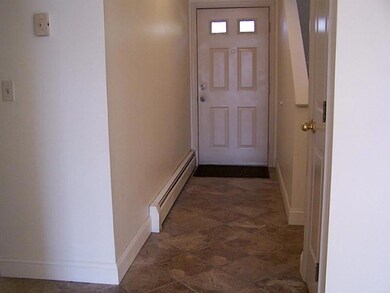 Entry. Tile in entry hall and kitchen.