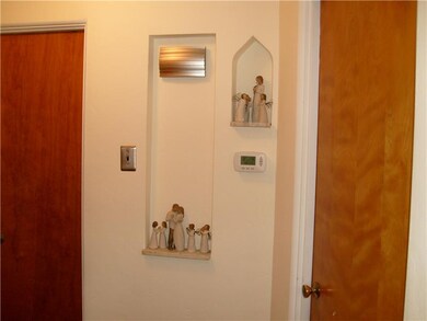 Interior Space/Layout. Hallway. Original wood doors.