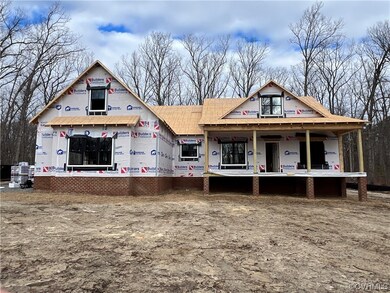 Property in mid-construction featuring covered por