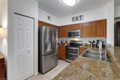 Kitchen with appliances with stainless steel finis
