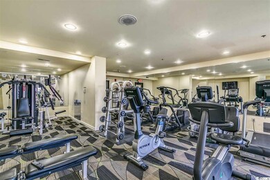 Gym with carpet floors, recessed lighting, and bas
