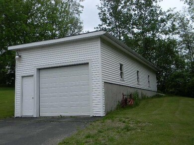Detached double-length garage.