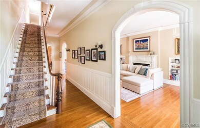 Foyer leads upstairs or to front living room.