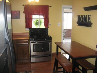 The kitchen includes a door that leads to the cove