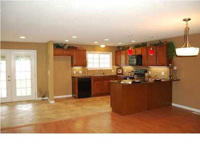 View of kitchen & dining area from front door