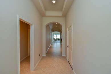 Extravagant entryway that will wow all of your guests!  Tray ceilings and diagonal tiles that give it that extra touch!