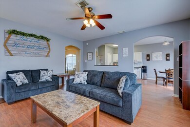 Another view of the living room shows the open flo