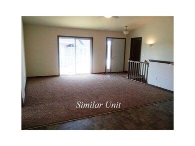 Living Room. Picture is of similar unit.