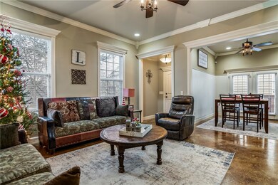 Living room open to dining and kitchen