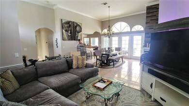 Living/Dining Rooms with French Doors to Pool