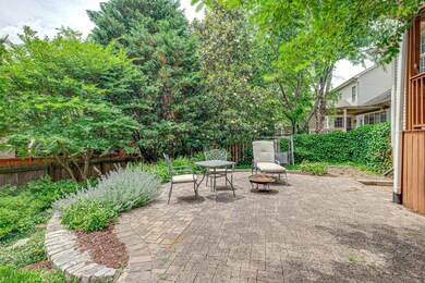 Large patio with beautiful gardens