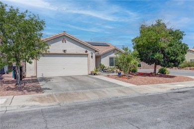 View of front of home with driveway, an attached g