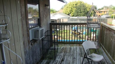 Back deck overlooking fenced yard